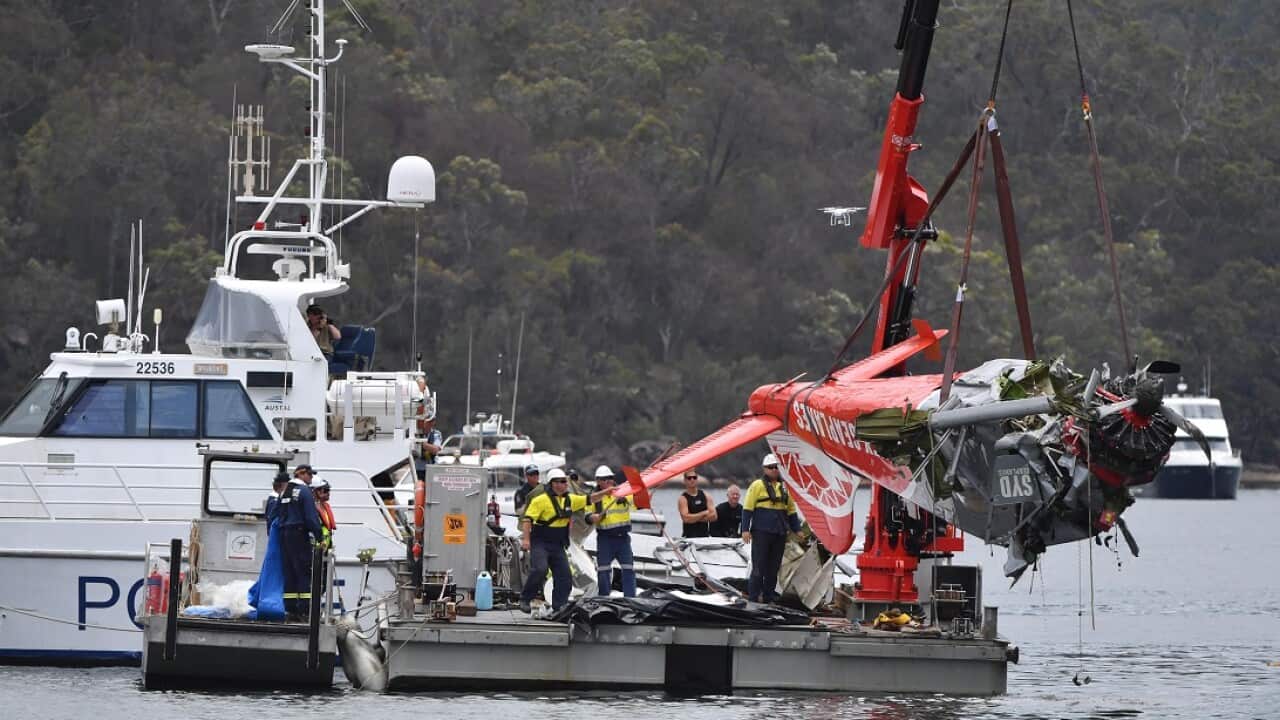 NSW police and salvage personnel recover the wreckage of a seaplane that crashed into Jerusalem Bay, north of Sydney, Thursday, January 4, 2018. (AAP Image/Mick Tsikas) NO ARCHIVING