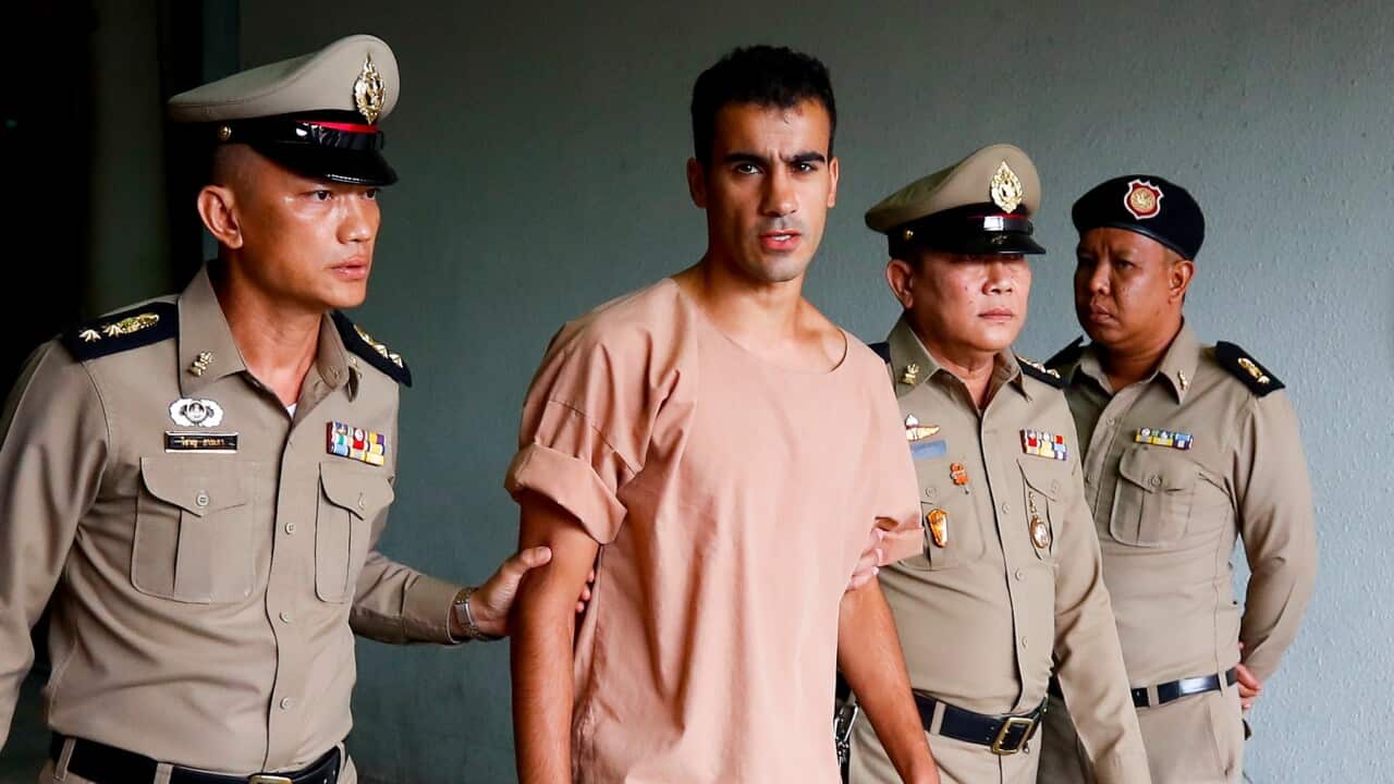 Hakeem Al-Araibi being escorted out of court by Thai prison officers in February