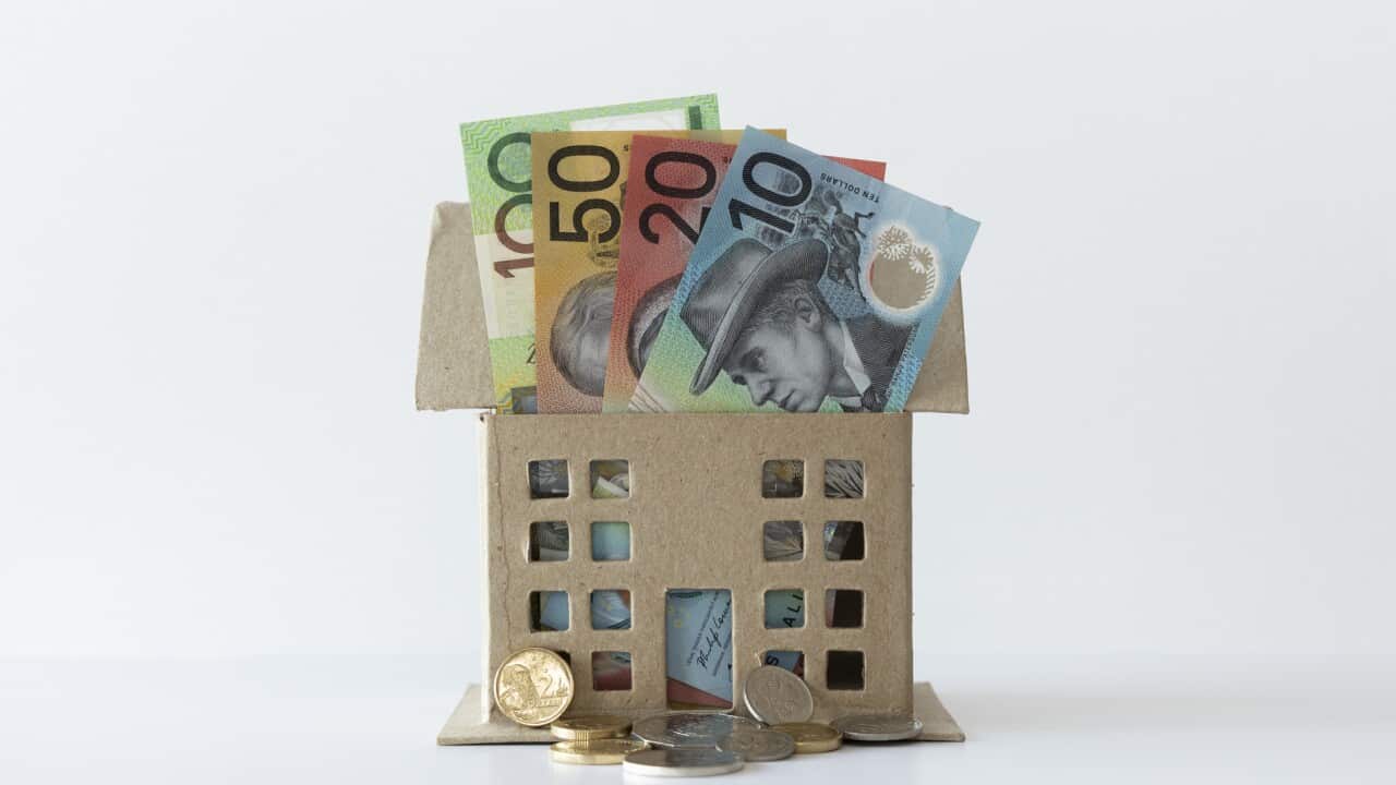 House containing some Australian bank notes and coins.
