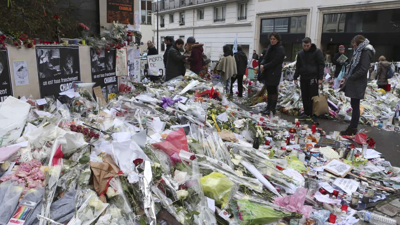Flowers outside Charlie Hebdo headquarters in Paris