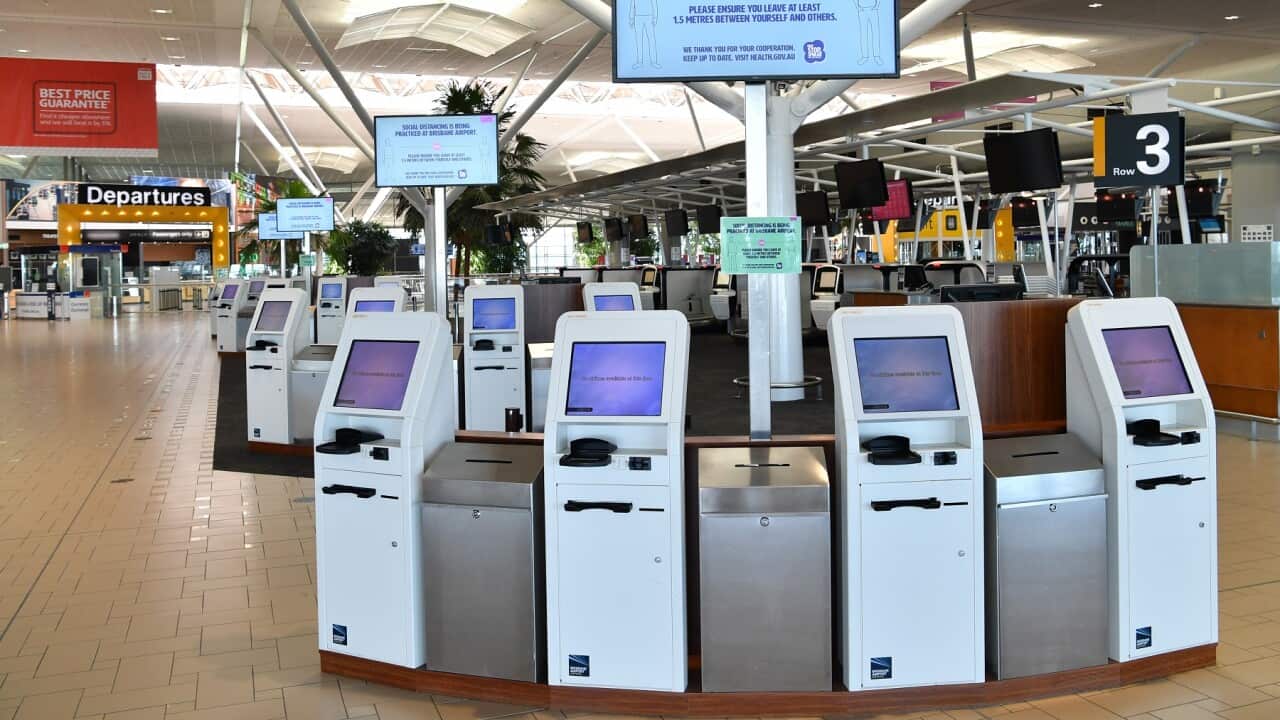 Empty check-in counters at Brisbane International Airport
