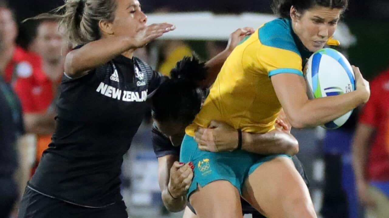 Charlotte Caslick (R) of Australia