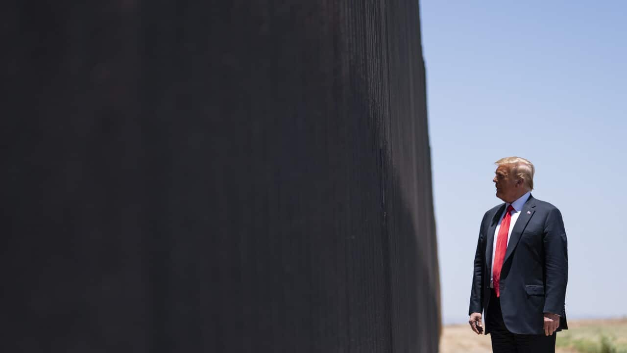 President Donald Trump tours a section of the border wall, Tuesday, June 23, 2020, in San Luis, Ariz. (AP Photo/Evan Vucci)