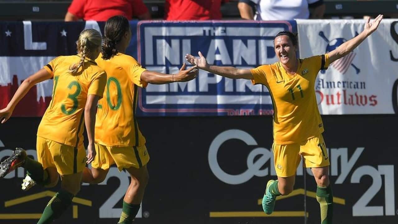 Australia's Lisa De Vanna (No.11), Temeka Butt (l) and Sam Kerr
