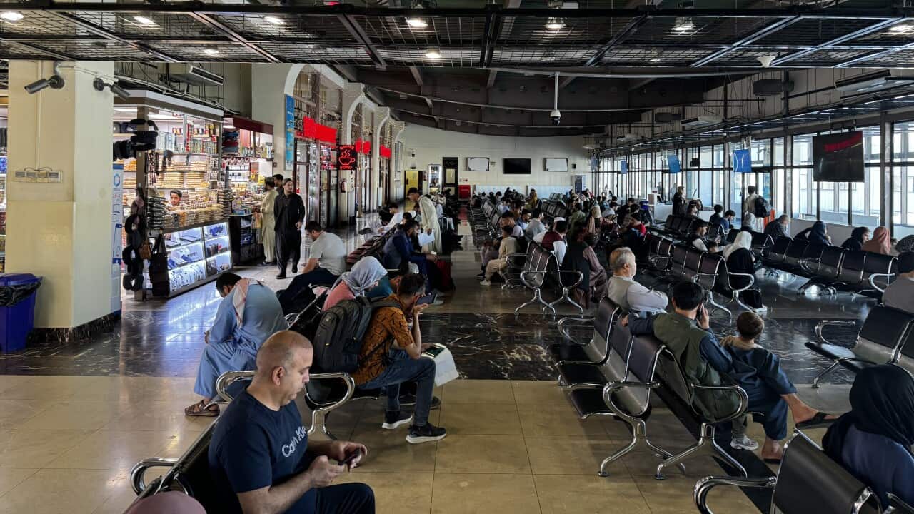 A picture of people at Kabul airport