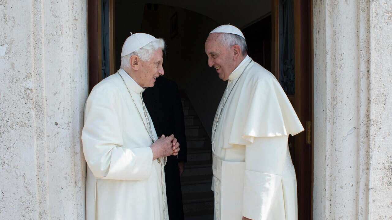 Pope Francis (R) meeting Pope Emeritus Benedict XVI at Vatican City in 2015