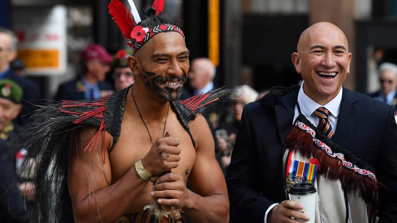 Two New Zealanders wait to march before the Anzac Day March on Elizabeth St in Sydney, Sunday, April 25, 2021. (AAP Image/Mick Tsikas) NO ARCHIVING