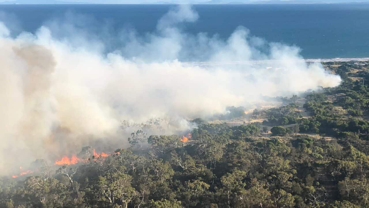 A supplied image obtained Wednesday, April 10, 2019 of a bushfire near Dolphin Sands on Tasmania's east coast, Tuesday, April 9, 2019. (AAP Image/Supplied by Tasmania Fire Service) NO ARCHIVING, EDITORIAL USE ONLY