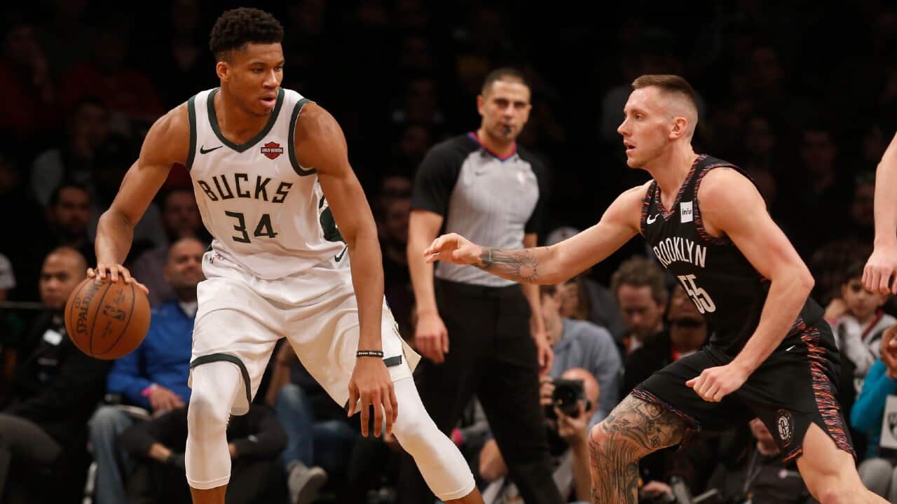 Mitch Creek guarding Giannis Antetokounmpo during the former's time with the Brooklyn Nets in 2019