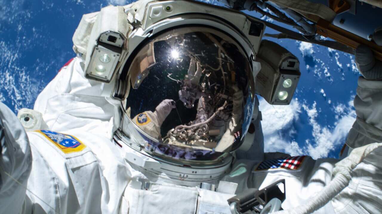 US NASA astronaut Barry Wilmore operating outside the ISS