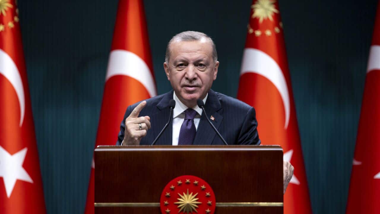 Turkish President Recep Tayyip Erdogan makes a statement during a press conference following the cabinet meeting at the Presidential Complex in Ankara, Turkey