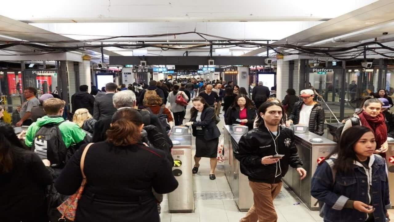 commuters at town hall sydney