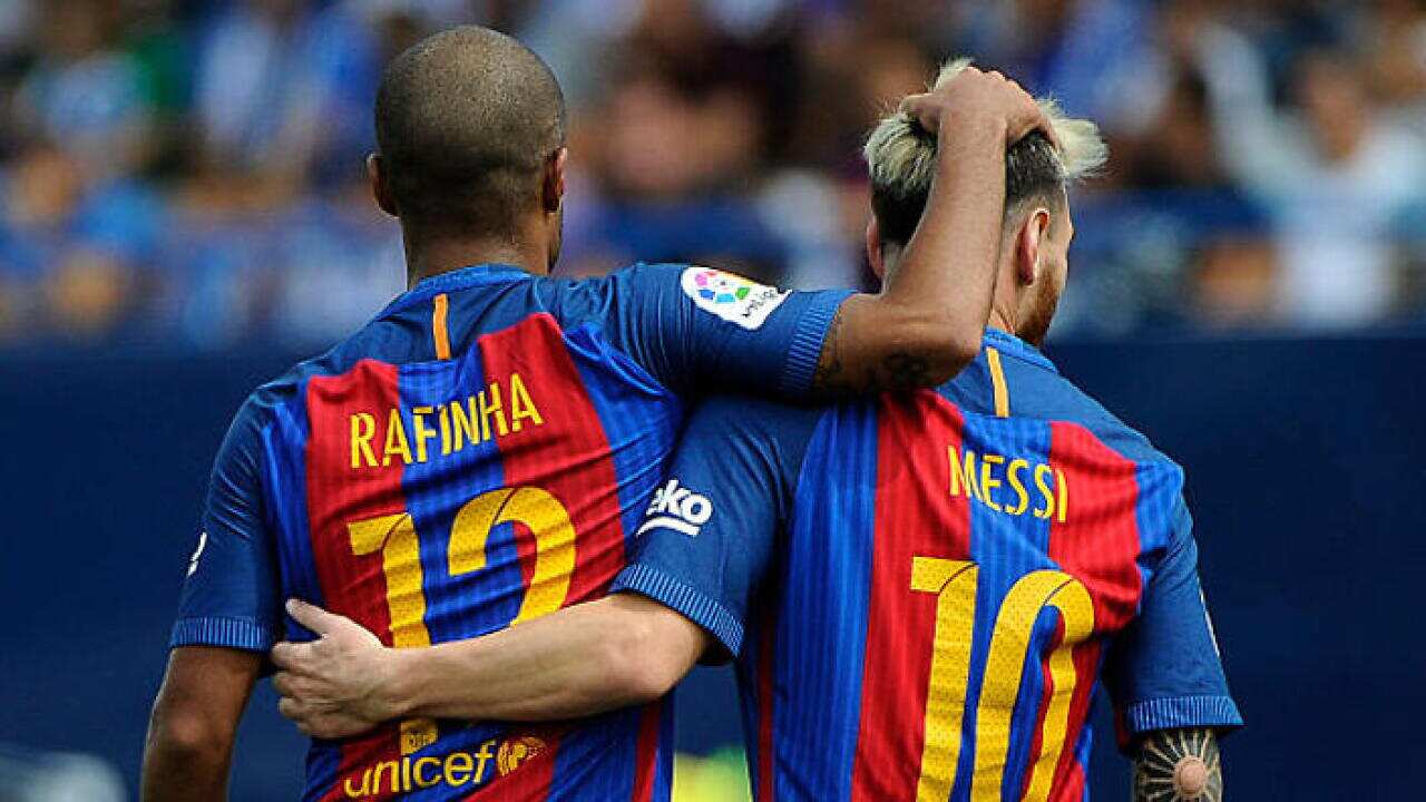 Rafinha and Lionel Messi celebrate during their win against Leganes