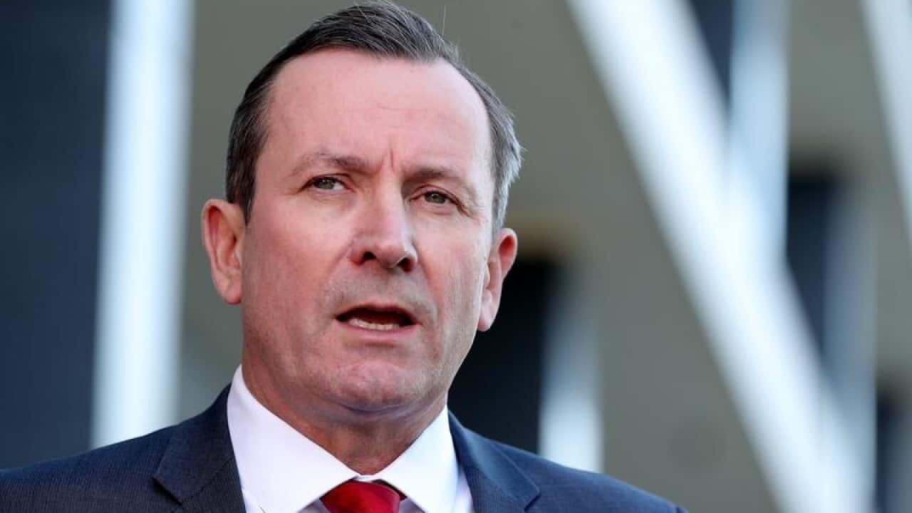 Western Australia's premier is not ruling out delaying the reopening of interstate borders after a Sydney hotel quarantine worker tested positive to COVID-19.