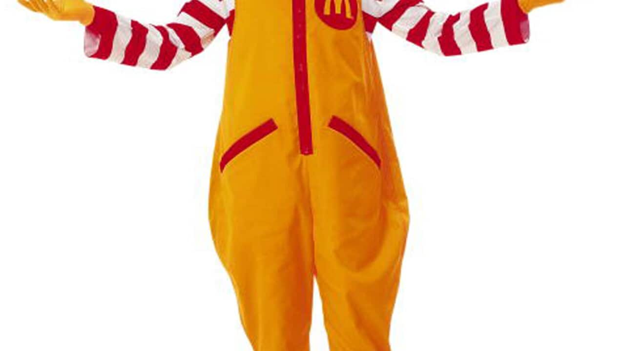 This photo released by McDonald's Corp. shows a Ronald McDonald in his trademark yellow jumpsuit.