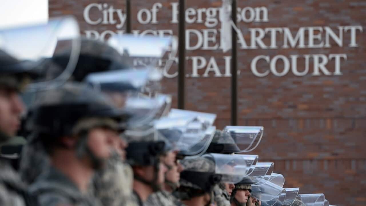 national_guard_troops_secure_the_police_station_in_ferguson_missouri_getty_images_larger.jpg