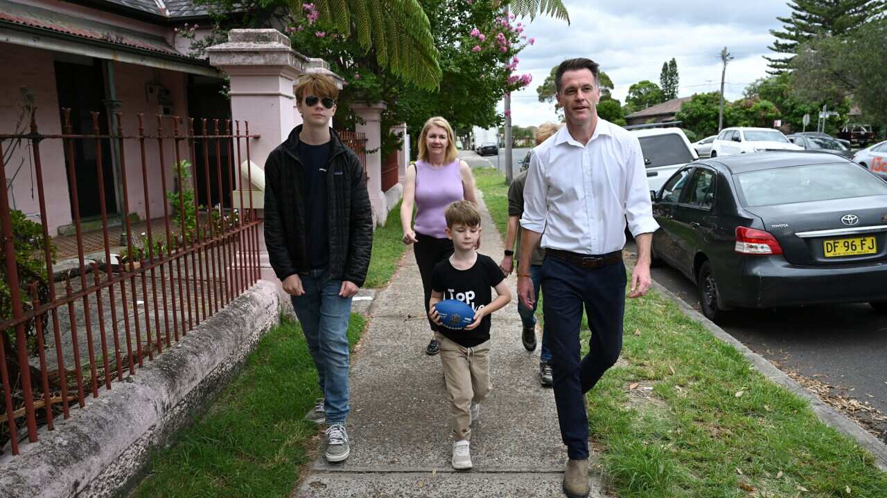 Chris Minns and his family celebrate the day after election night