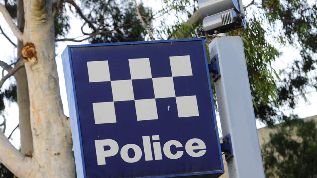 A police station sign