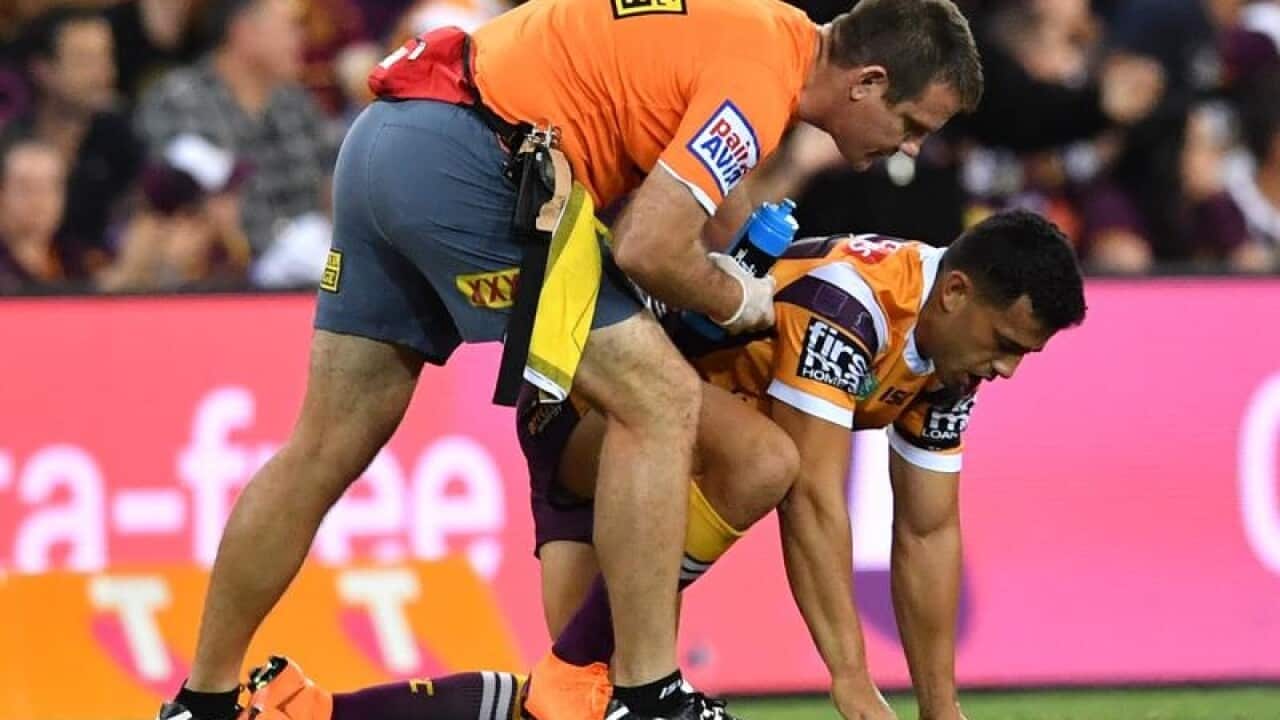 Jordan Kahu of the Broncos is seen injured.