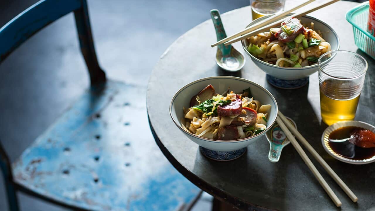 Wok-tossed rice noodles with char siu and egg