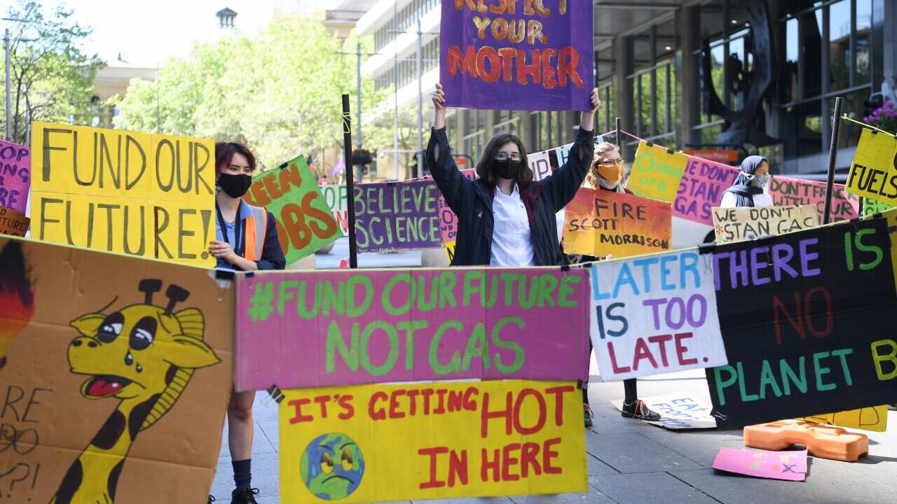 A small gathering of school students take part in Fund Our Futures Not Gas climate rally in Sydney, Friday, September 25, 2020