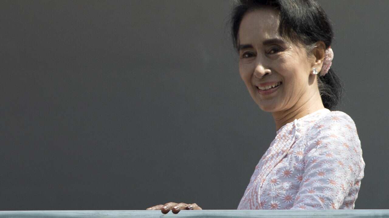 Leader of Myanmar's National League for Democracy party, Aung San Suu Kyi, smiles to her supporters after delivering a speech. (AP)