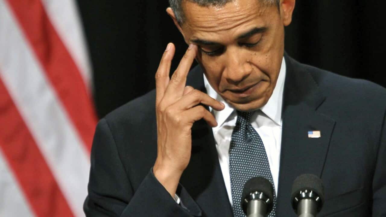 Obama vows to try to stop gun deaths
