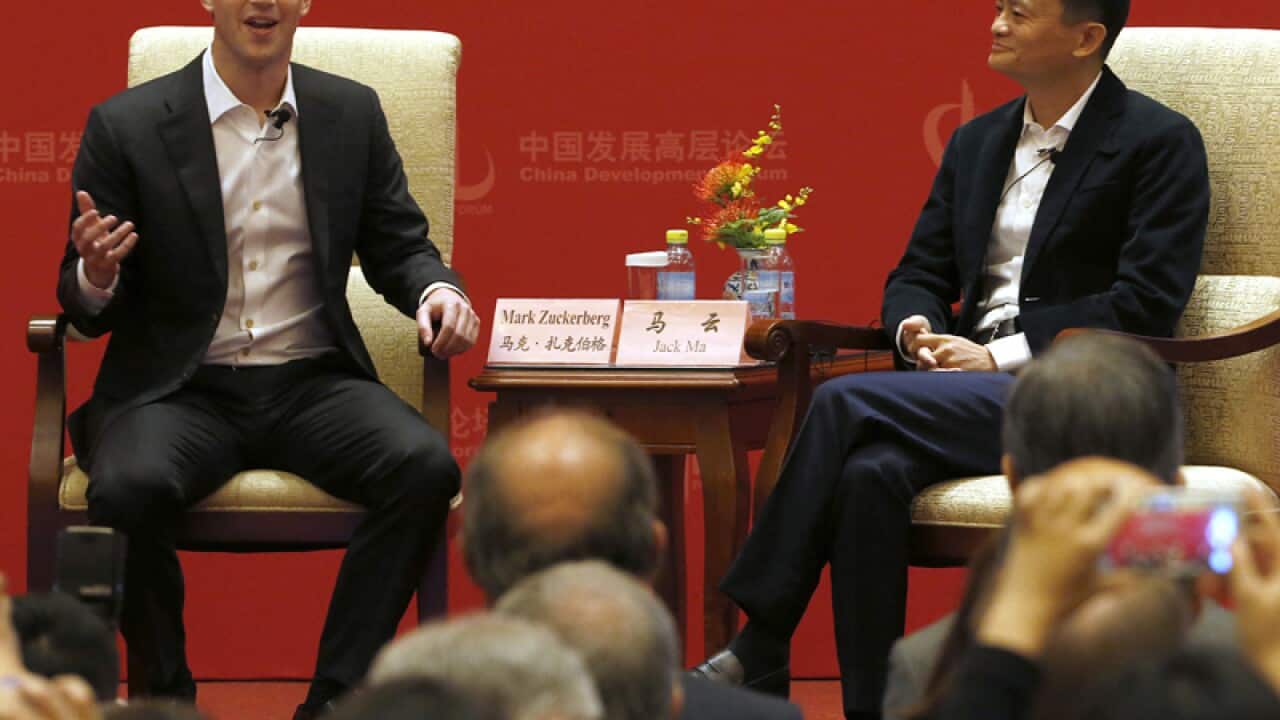Facebook CEO Mark Zuckerberg, speaks as Jack Ma, executive chairman