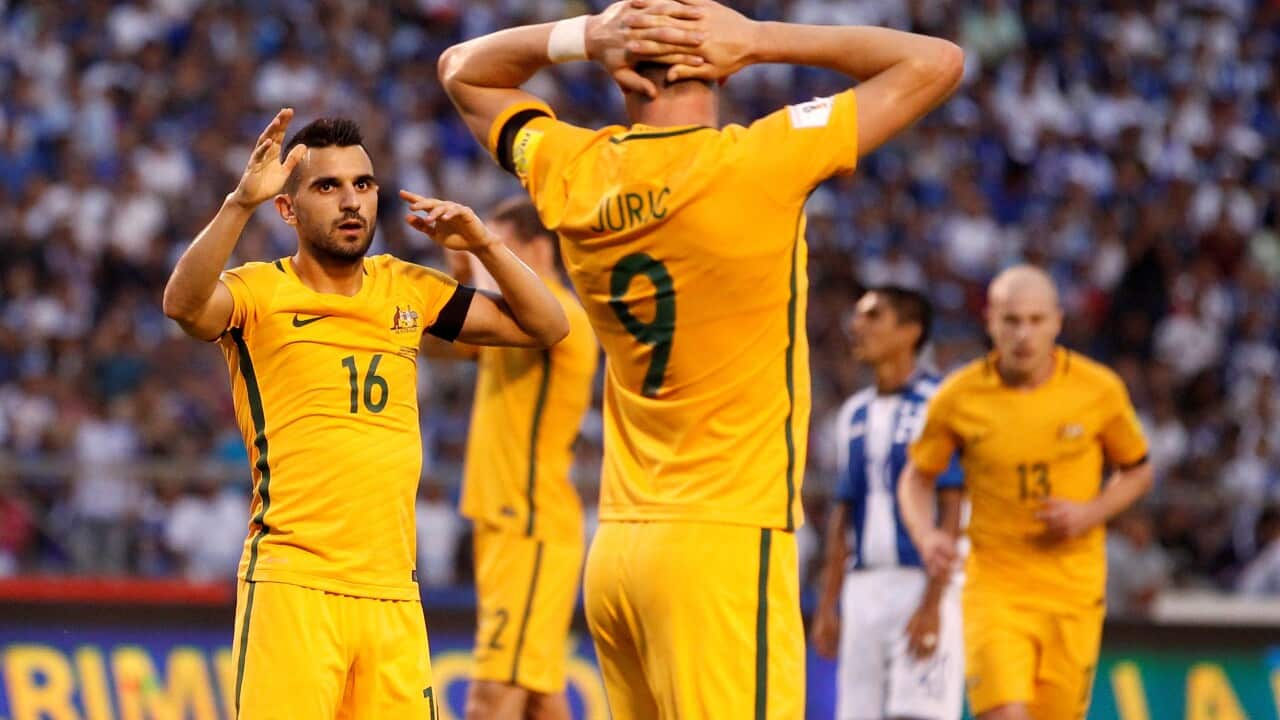 Australia's player stand on the pitch after a 0-0 draw during the first leg of a World Cup qualifier play-off against Honduras, at the Olympic Stadium in San Pedro Sula, Honduras, Friday, Nov. 10, 2017. (AP Photo/Moises Castillo)