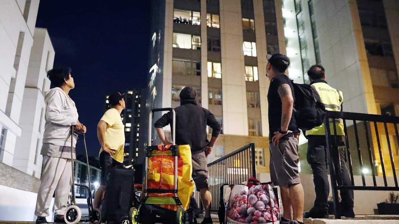 Residents evacuate Chalcots Estate tower blocks in Camden, London, Britain, 23 June 2017.
