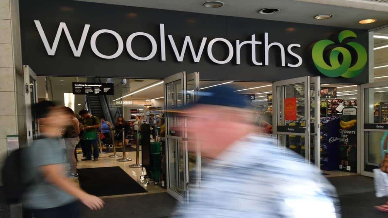 Woolworths signage outside a store.