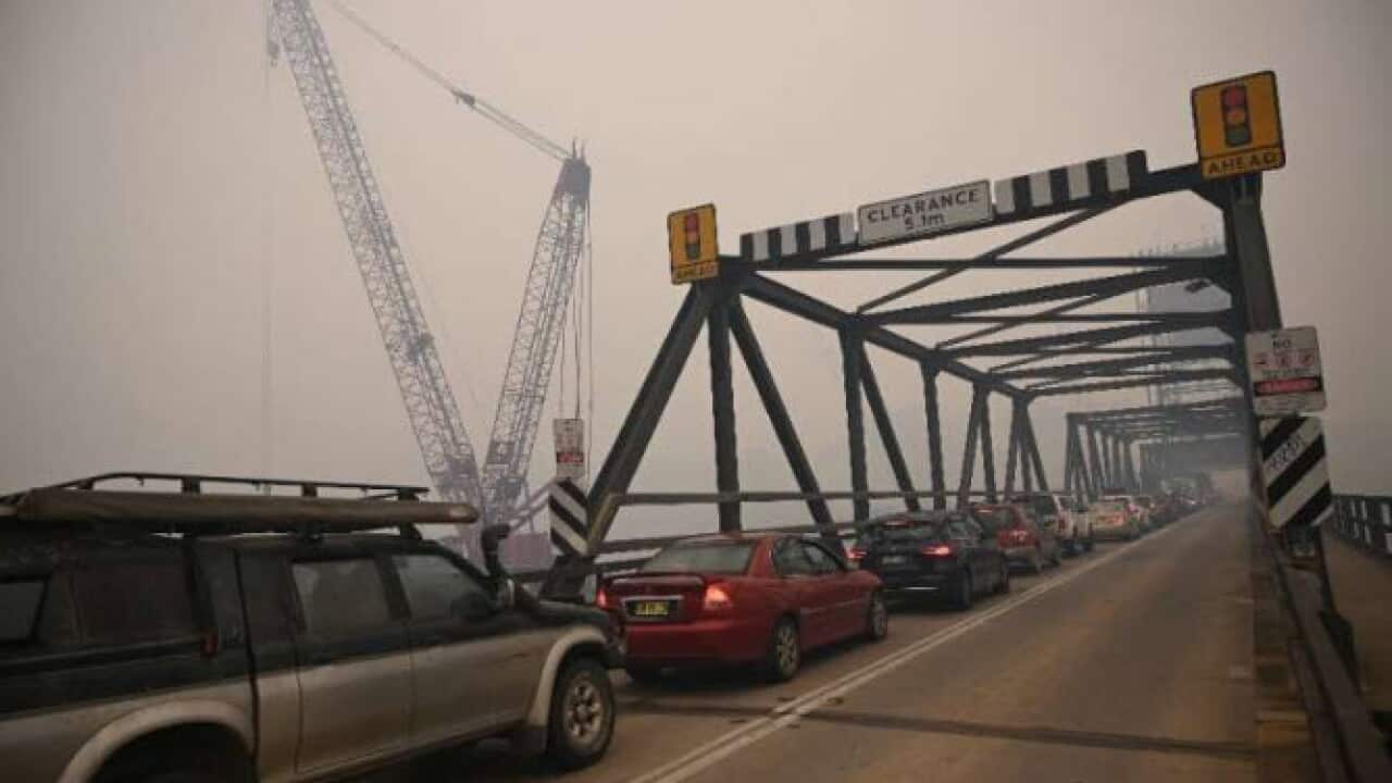 Australia ordered residents and tourists out of the path of raging bushfires