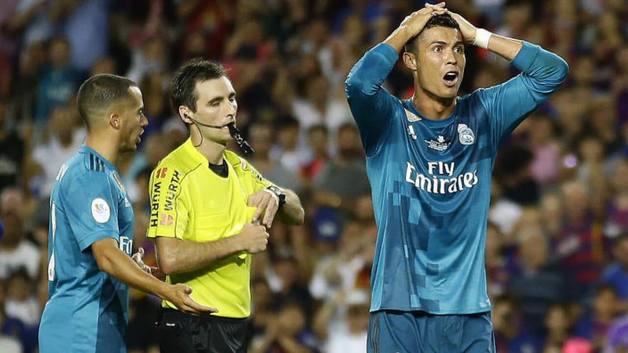 Cristiano Ronaldo, right, scored but also saw red against Barcelona