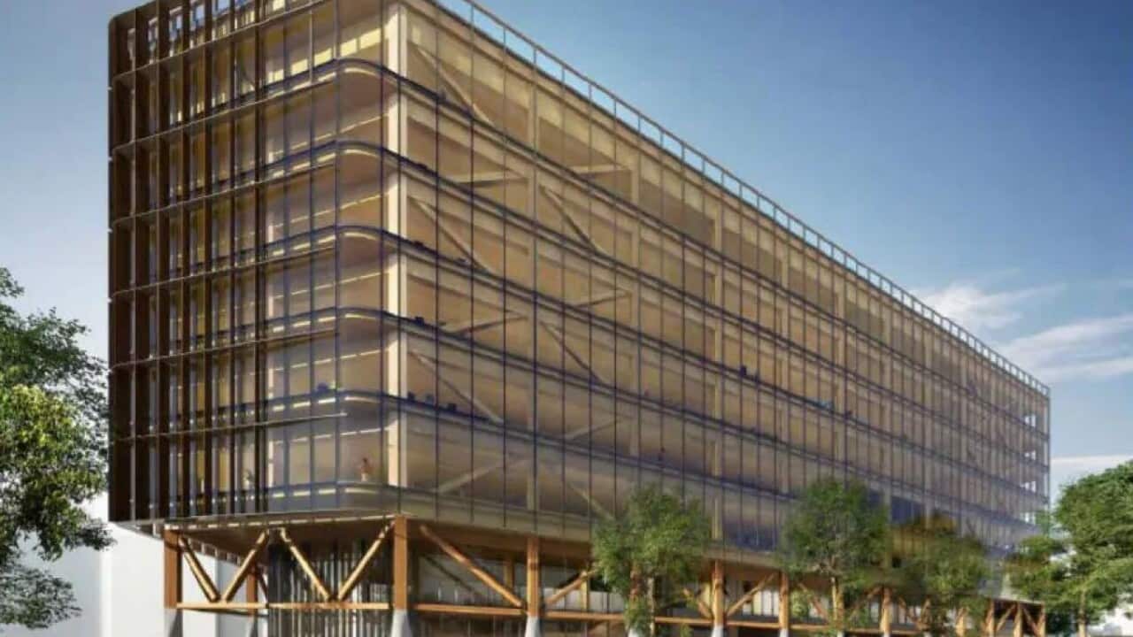 The plans describe the building as “architecturally distinct”