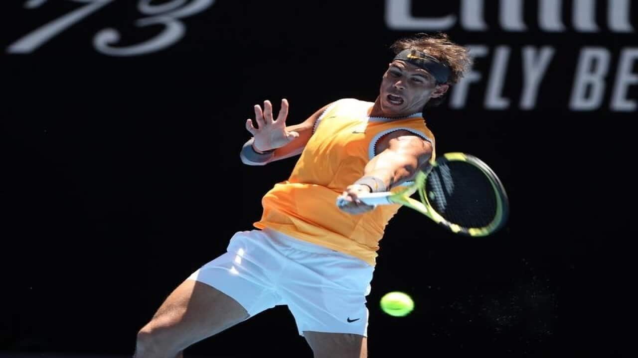 Rafael Nadal of Spain in action against James Duckworth.