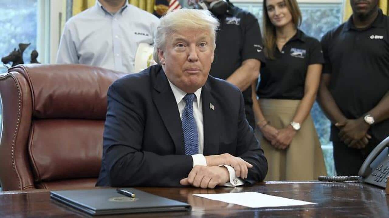 epa06248932 US President Donald J. Trump makes remarks prior to signing the National Manufacturing Day Proclamation in the Oval Office of the White House in Washington, DC, USA, 06 October 2017. EPA/Ron Sachs / POOL