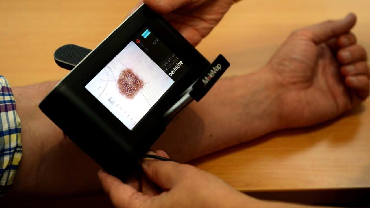Stock image of a patient being checked for skin cancers at a skin cancer clinic in Sydney