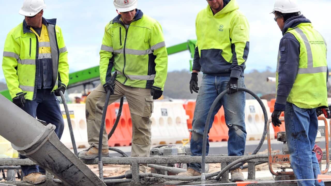 Construction workers perform duties