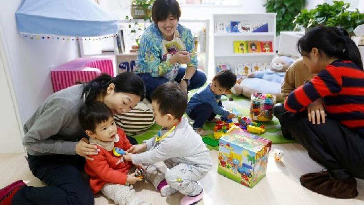 Mothers and children at play