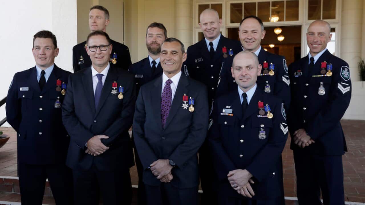 Cave diving mates Richard Harris and Craig Challen and seven other Australians were rewarded for their roles in the Thai cave rescue.