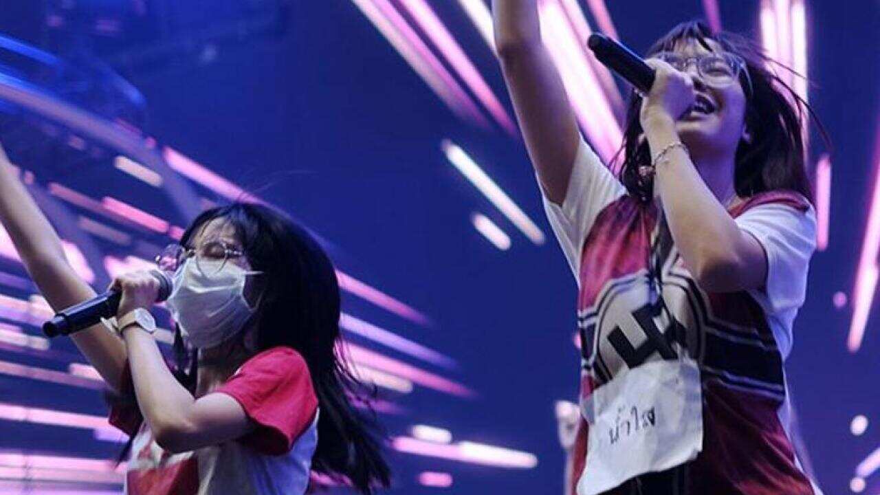 Screenshot of Pichayapa ‘Namsai’ Natha of Thai pop group BNK48 wears a Nazi-themed jersey at what was described as a 'televised rehearsal'