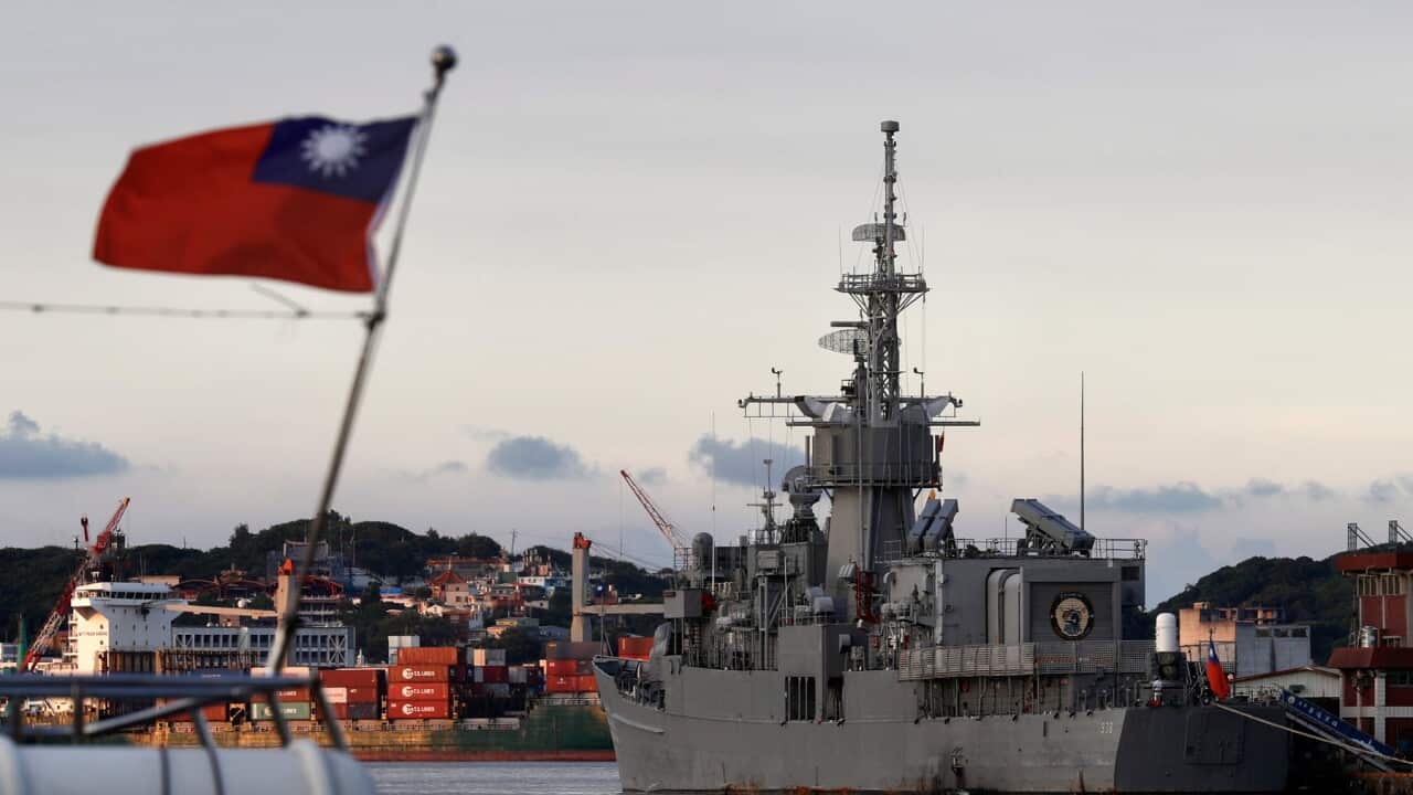 Taiwan’s navy vessel anchored at a harbour on the water