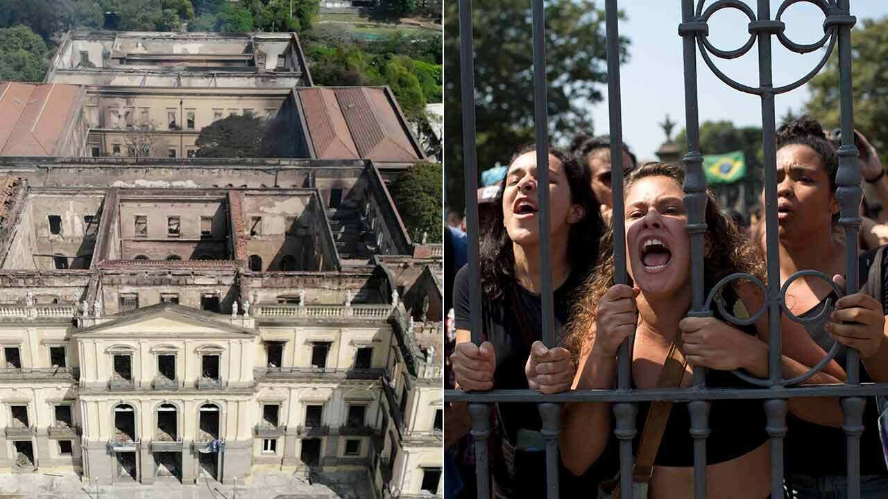An angry crowd has protested outside the gates of the gutted National Museum in Brazil.