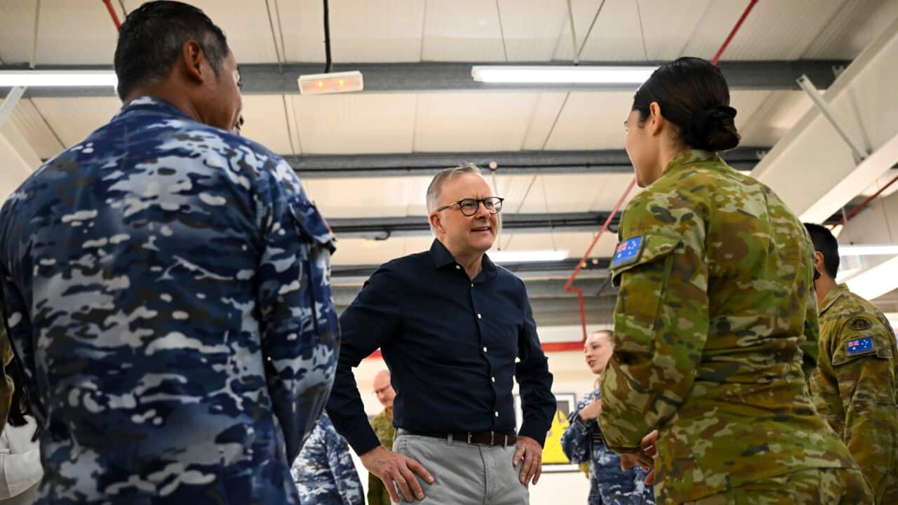 Prime Minister Anthony Albanese speaks to members of the Australian Defence Force during a visit to Camp Baird