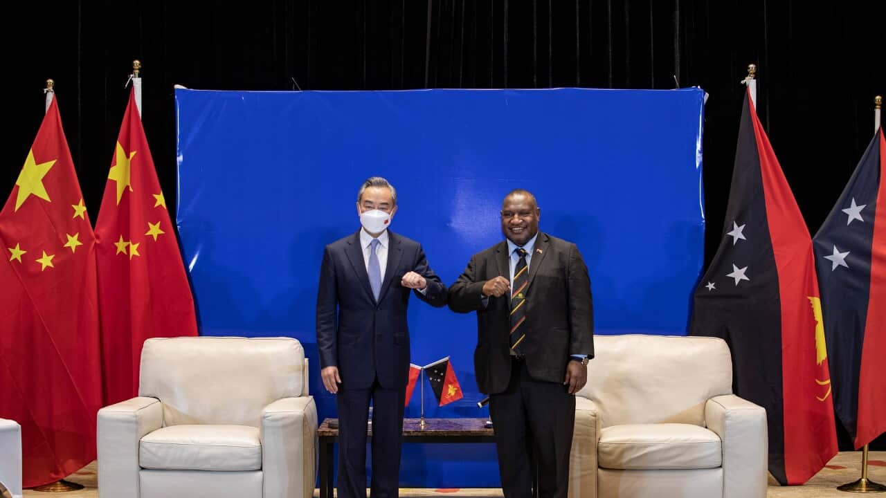 PNG Prime Minister James Marape (R) meets Chinese Foreign Minister Wang Yi in Port Moresby