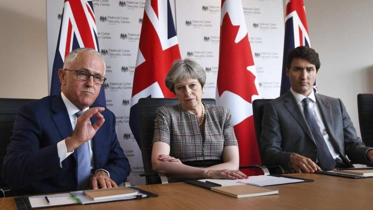 Malcolm Turnbull, Theresa May and Justin Trudeau.