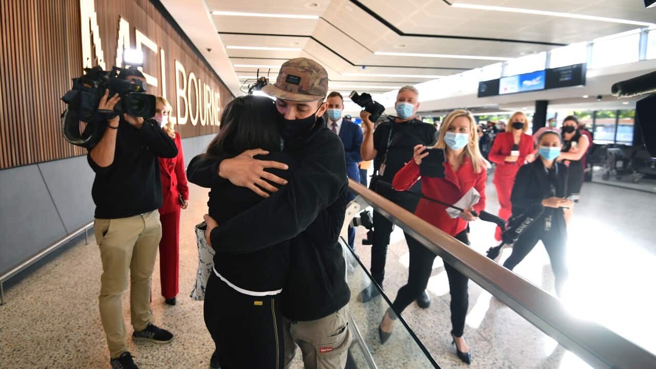 International passengers arrive at Melbourne Airport in Melbourne, Monday, February 21, 2022. Australia’s international borders have reopened without restrictions for fully vaccinated tourists and travellers. (AAP Image/Joel Carrett) NO ARCHIVING