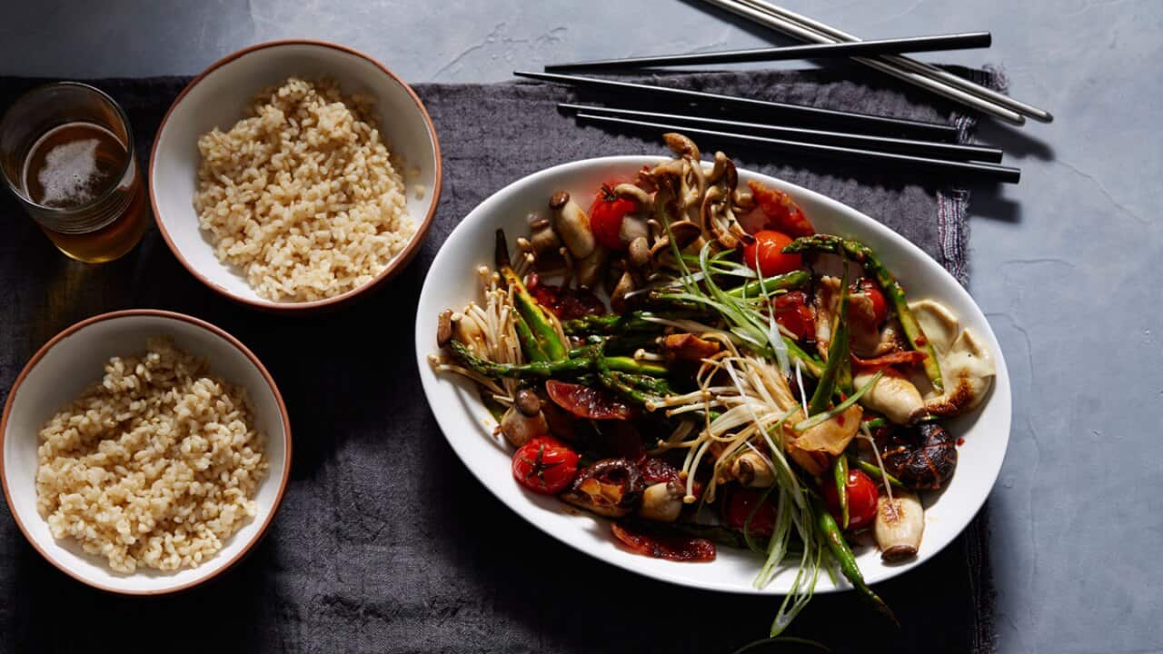 Spicy Asian mushroom stir-fry with Chinese sausage and tomato