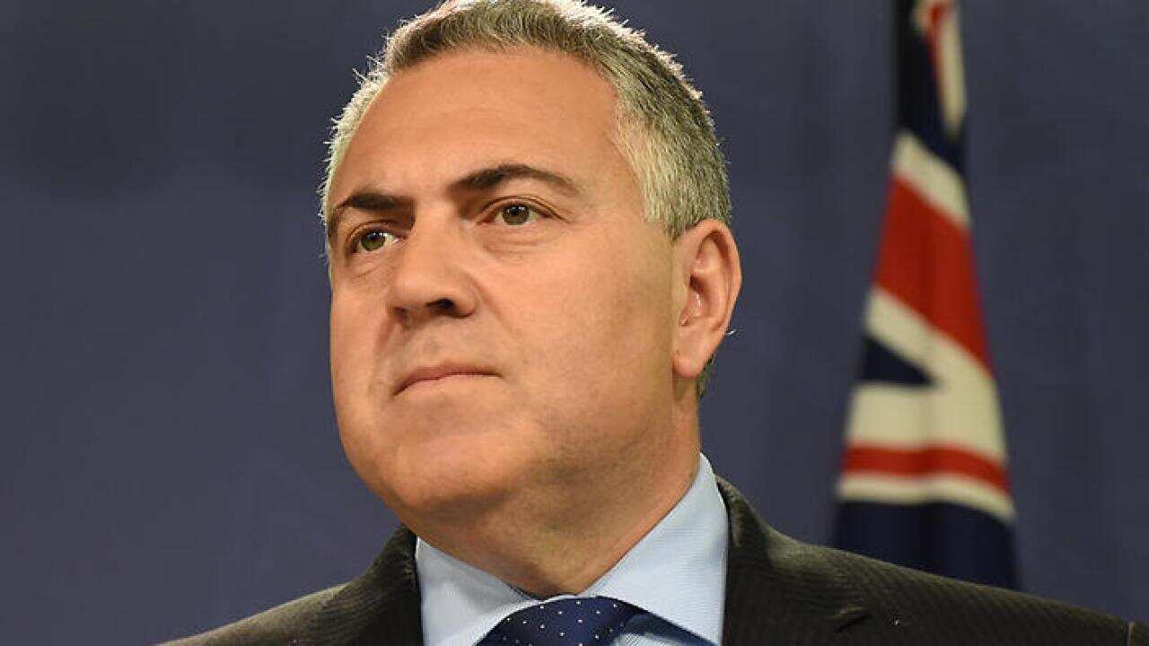 Australian Federal Treasurer Joe Hockey speaks to the media about foreign investment during a press conference at the Commonwealth Parliamentary Offices in Sydney, Tuesday, June 9, 2015. (AAP Image/Dean Lewins) NO ARCHIVING