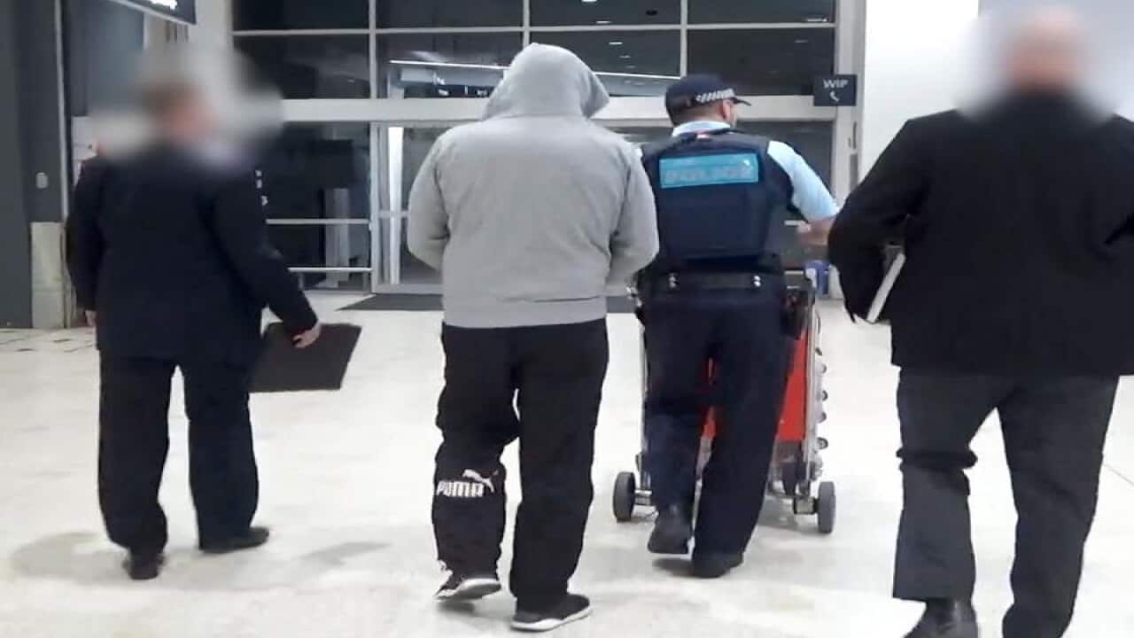 The 49-year-old man arriving at Sydney International Airport